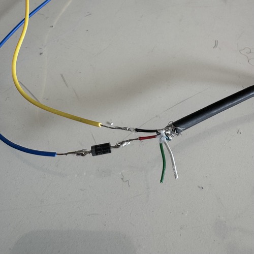LED strip soldered to USB cable with 1N4001 diode inline on the red wire